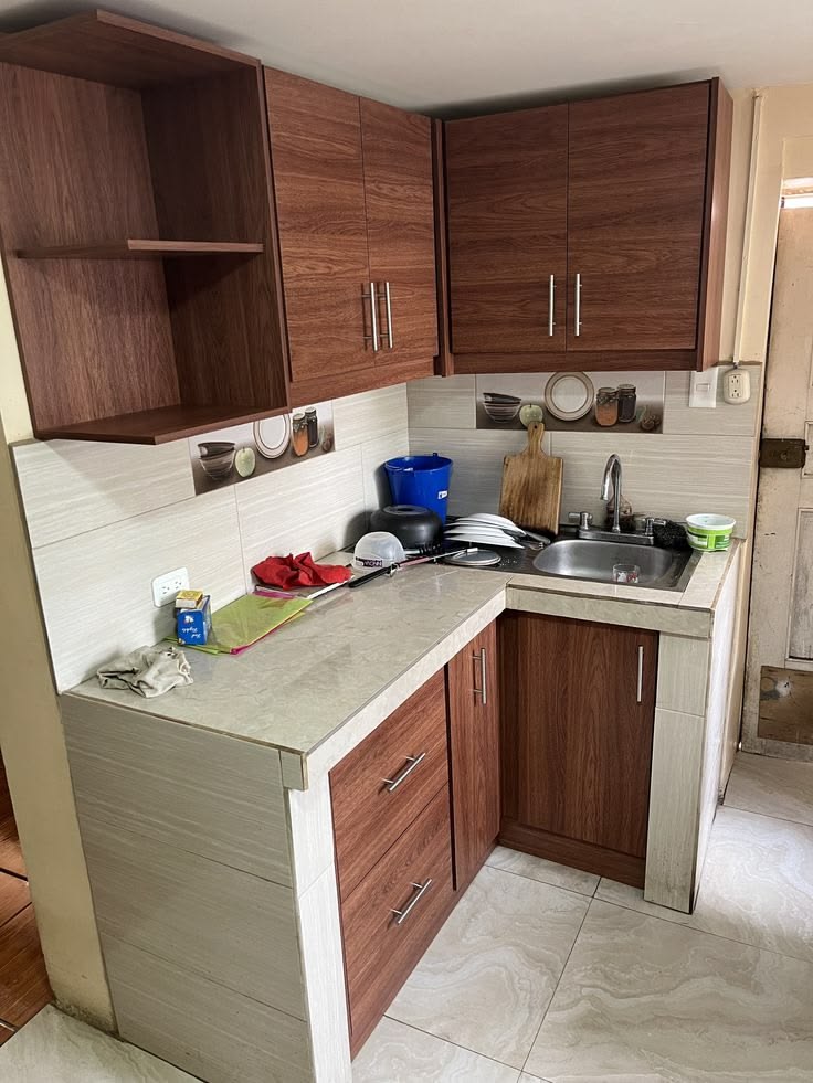 A kitchen with the basic cooking wares