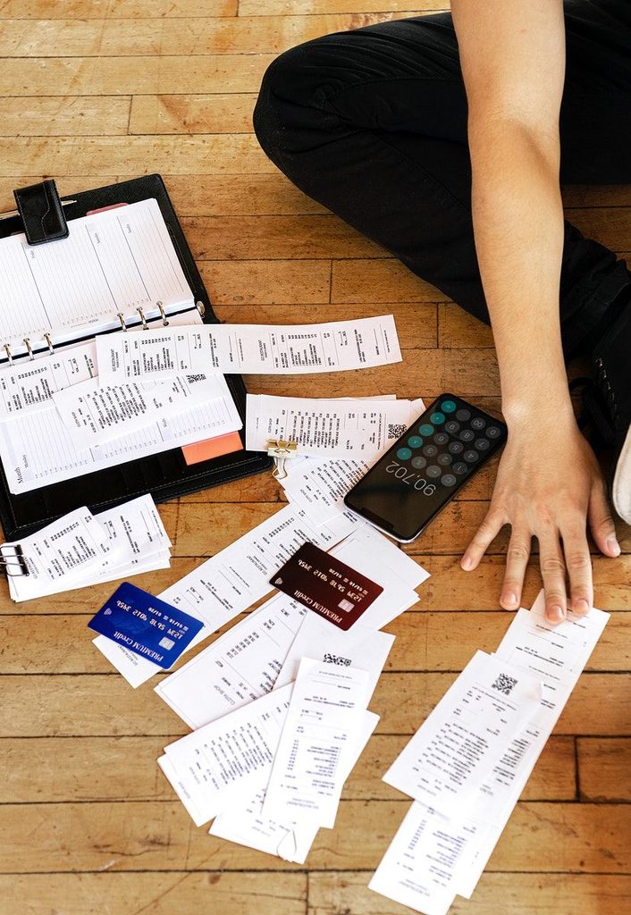 Someone reviewing a bank statement 