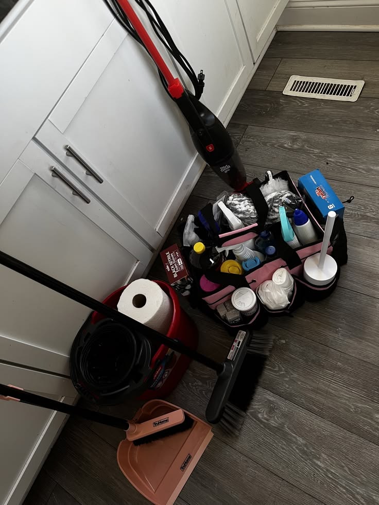 Basic cleaning supplies ready for cleaning an empty apartment