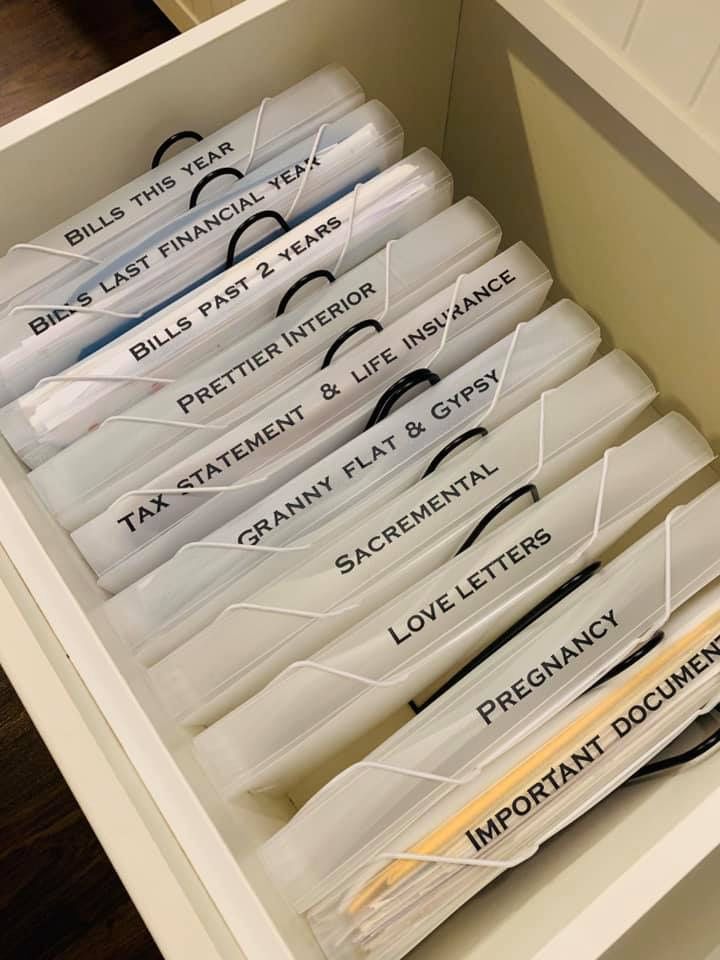  Important apartment papers organized inside a labelled folder