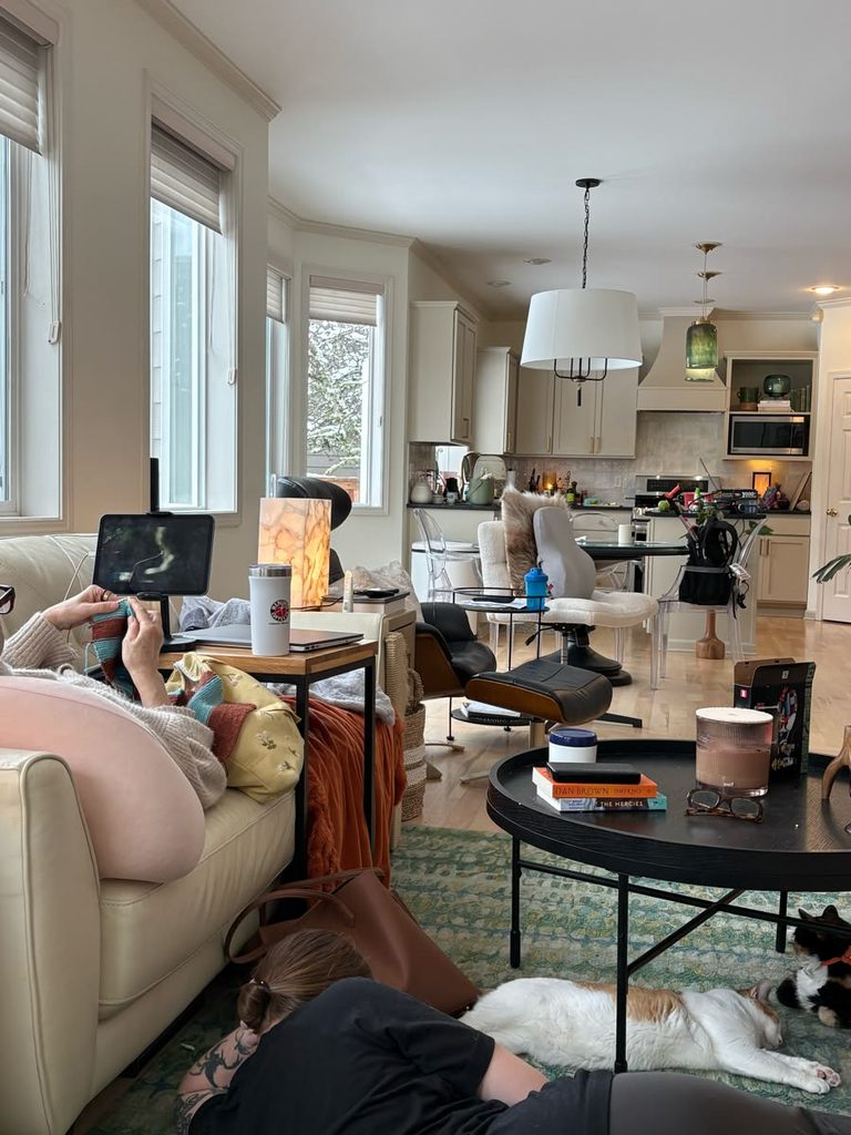 a young adult in an untidy apartment
