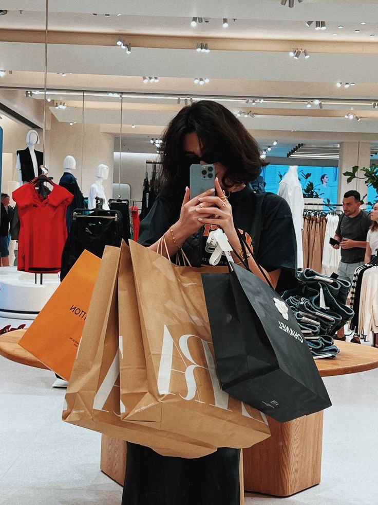 young lady with multiple shopping bags 