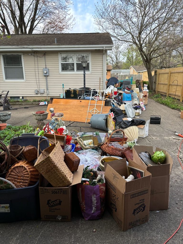 breaking down moving boxes and  rubbish, and recycling near their apartment