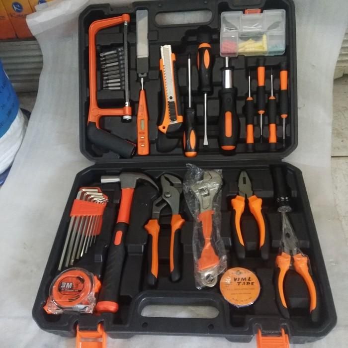 A small tool box opened to show a screwdriver, hammer, and other basic tools.