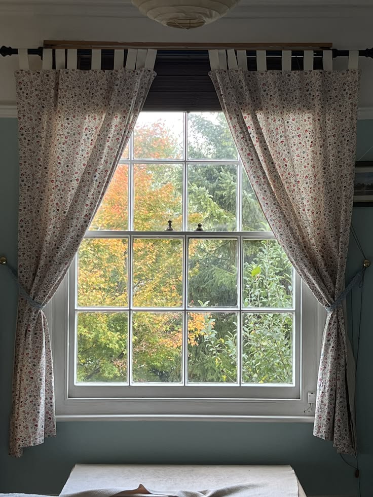 A simple apartment window with affordable curtains