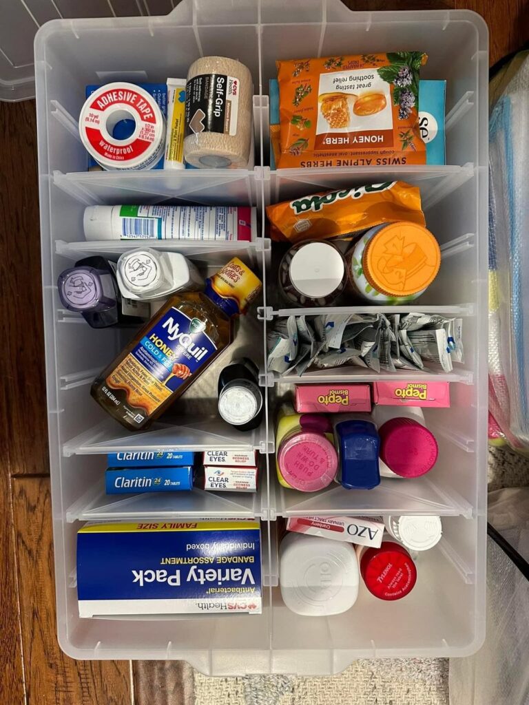 A compact first-aid kit organized on a desk